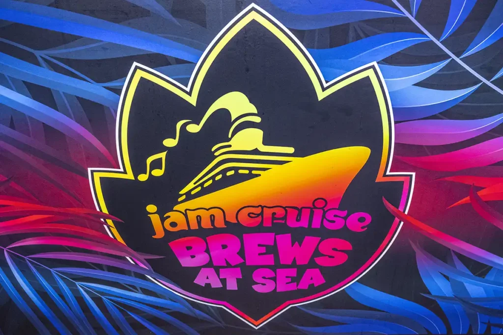 A "Jam Cruise Brews At Sea" sign.
