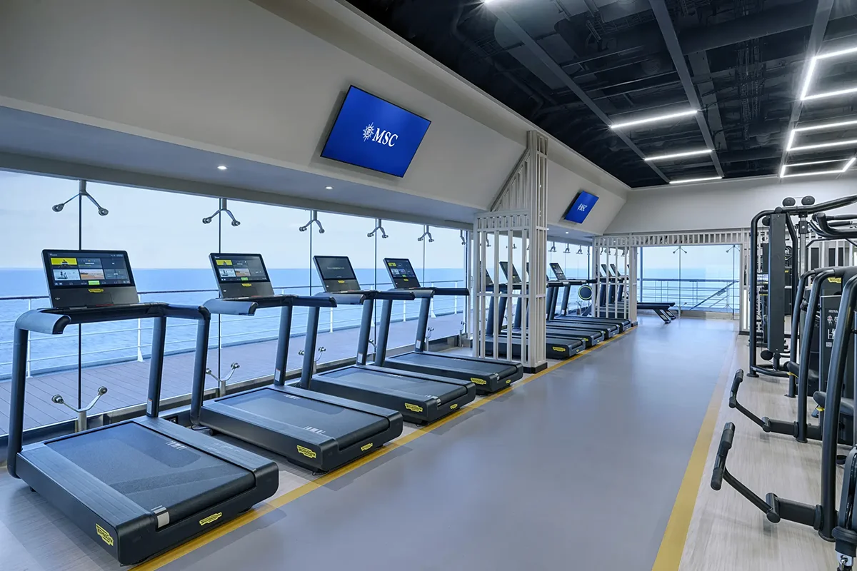 Treadmills lined up in the MSC Poesia gym.