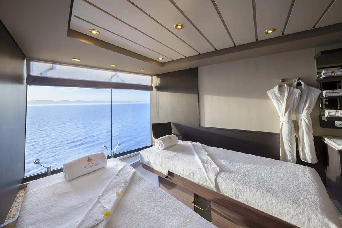 A massage table with an open ocean view.